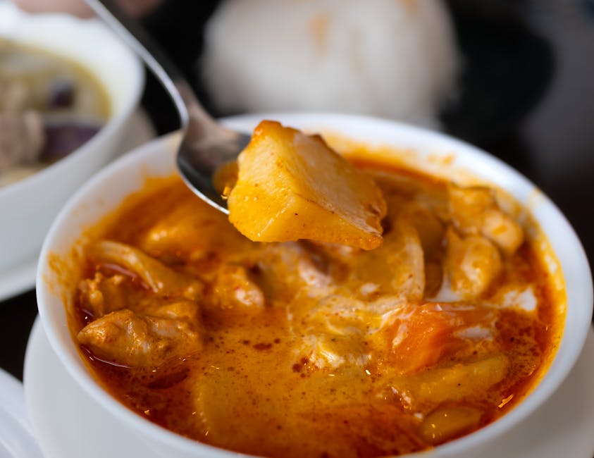 Close-up of a vibrant curry dish with fresh ingredients in a Tokyo restaurant setting