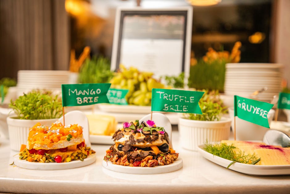 A delectable display of artisan cheeses topped with fresh ingredients at a gourmet event